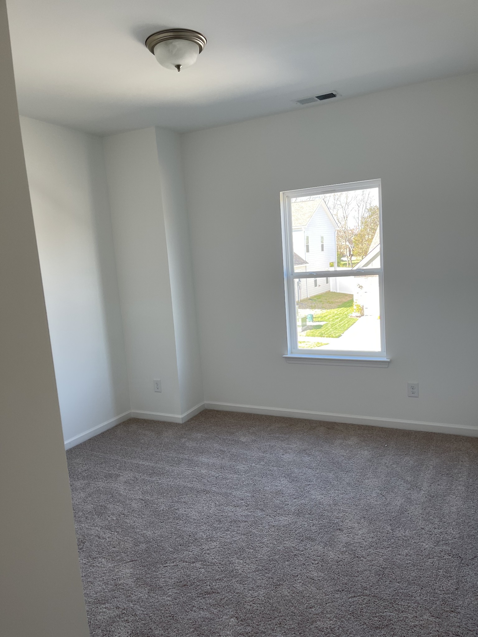 356 Winston Way Gallatin, TN 37066 - Photo 26 of 28 an empty room with a window