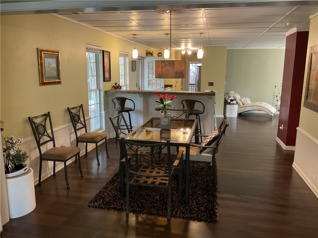 229 Cub Cove Drive Walhalla, SC 29691 - Photo 8 of 50 This inviting space features an open layout with rich hardwood flooring and abundant natural light.