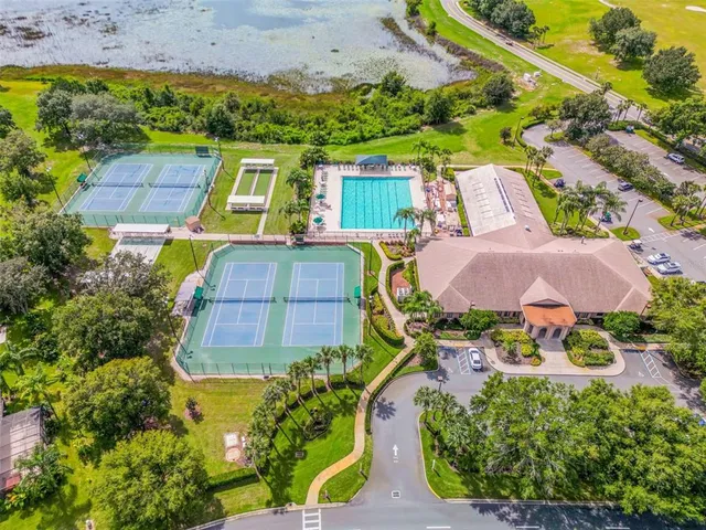 an aerial view of a house with a garden