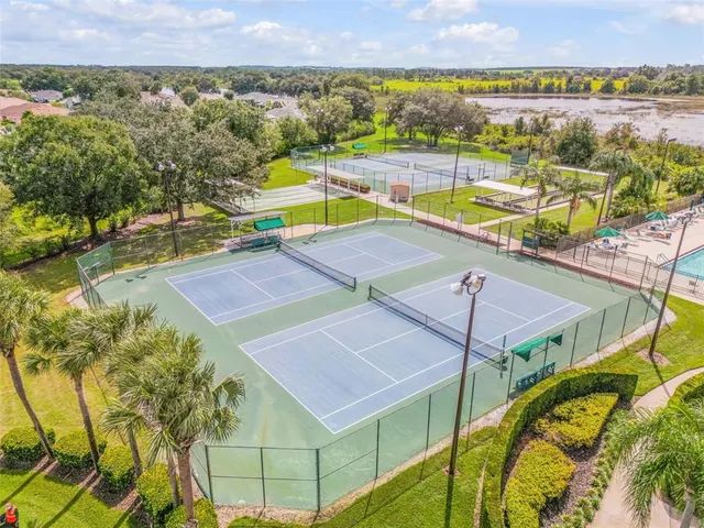 a view of a swimming pool with a lake view