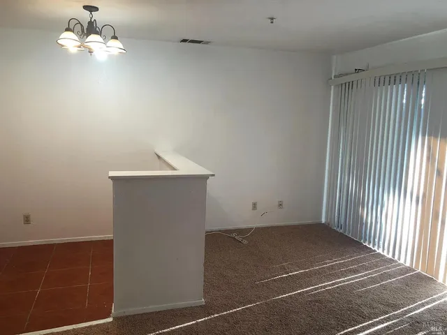 a view of a livingroom with a fan