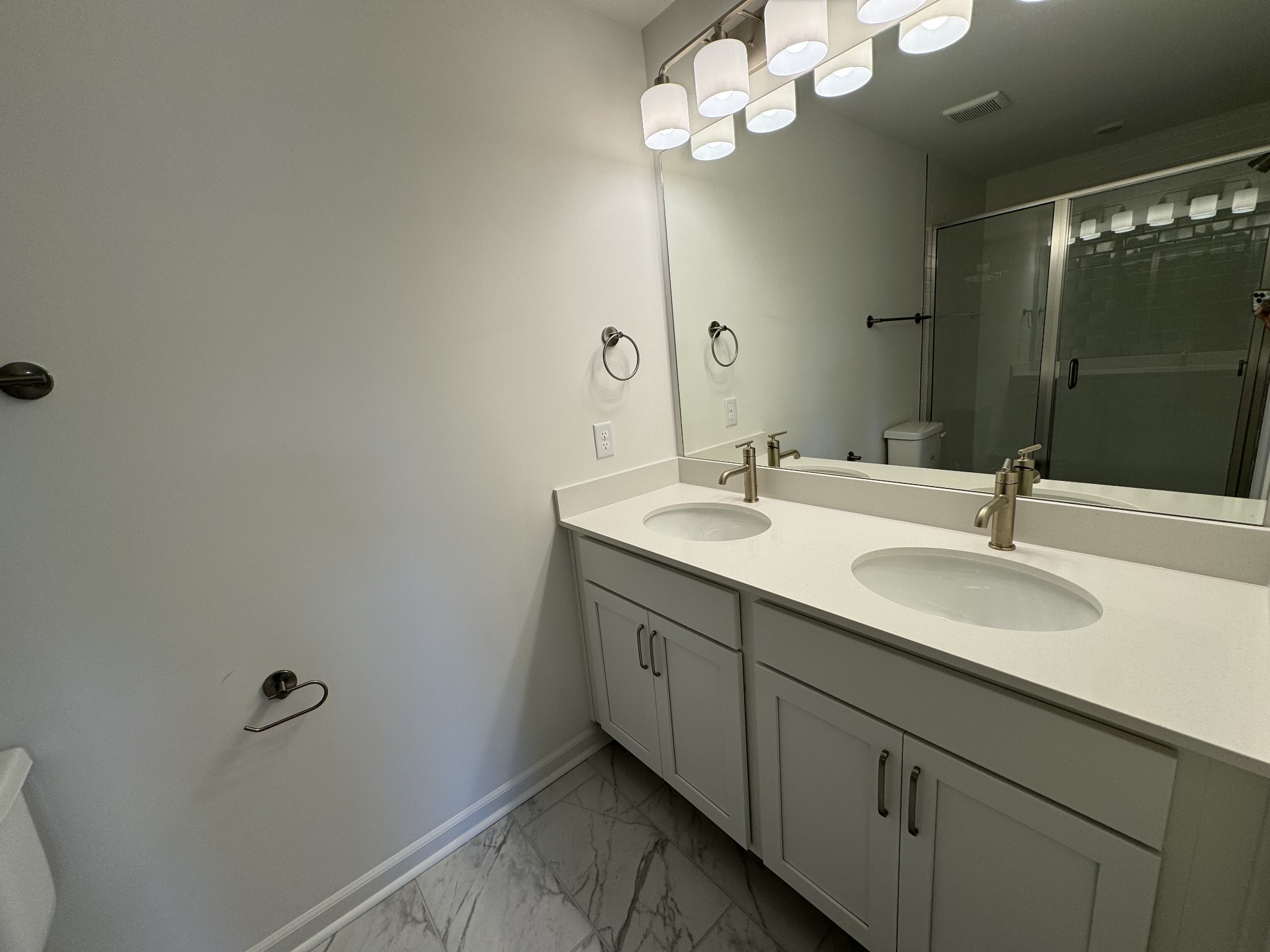 410 Blair Road Smyrna, TN 37167 - Photo 20 of 27 a bathroom with a double vanity sink and a mirror