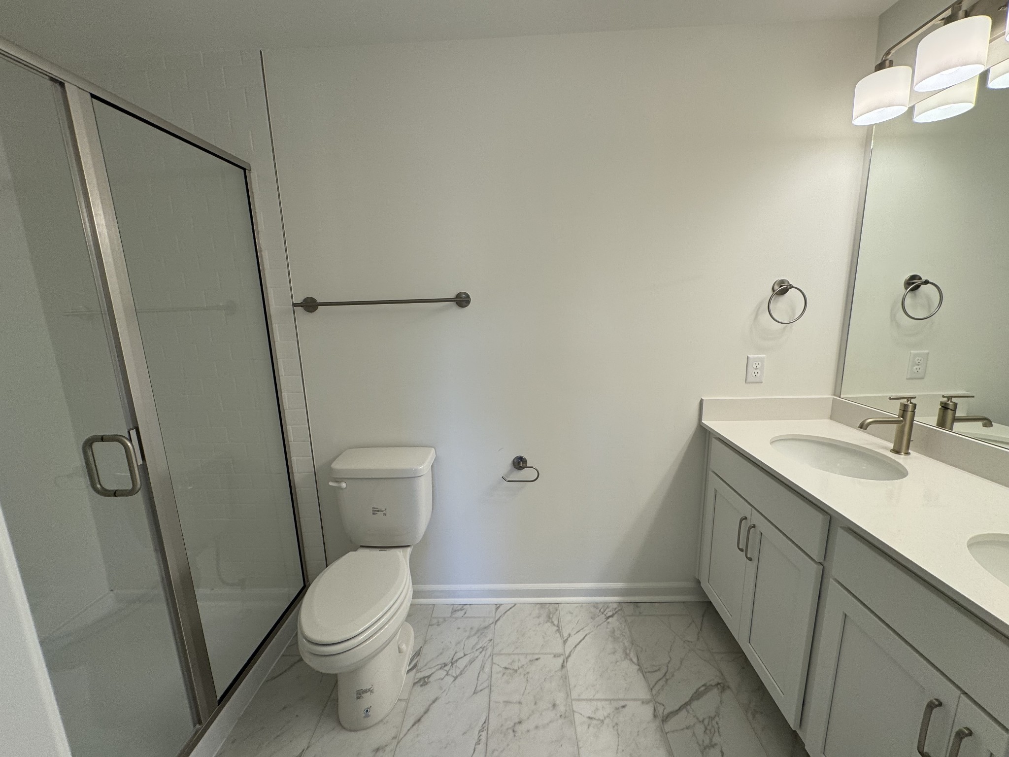 410 Blair Road Smyrna, TN 37167 - Photo 21 of 27 a bathroom with a granite countertop sink toilet and shower