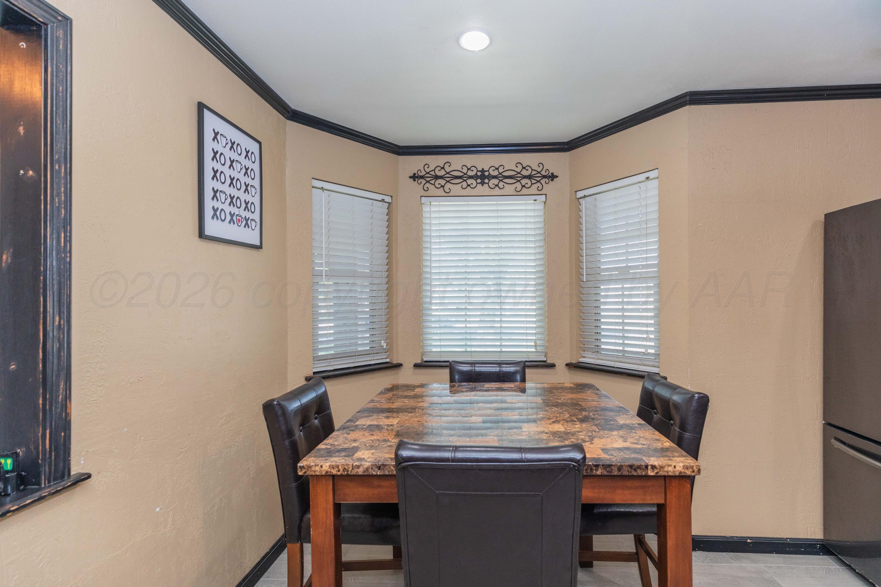 8135 Coronado Trail Amarillo, TX 79110 - Photo 12 of 38 DINING AREA 2