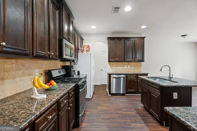 a view of a hallway with workspace