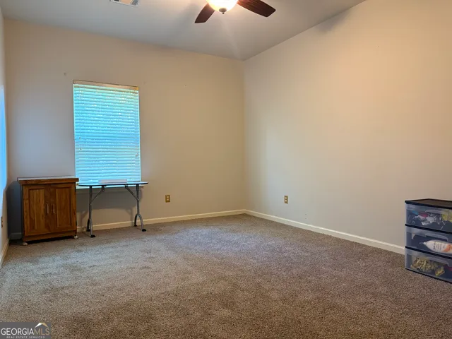 a view of a room with racks on the wall