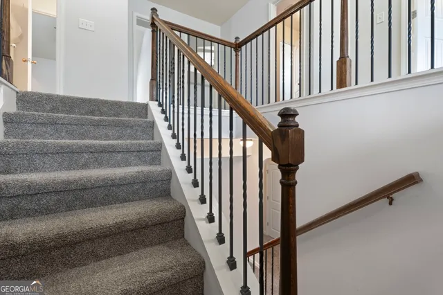 a close up of a sink and a mirror