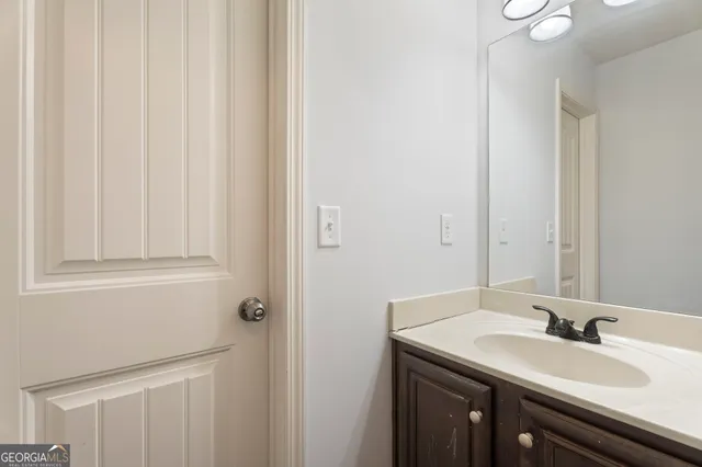 a view of a room with gym equipment and a projector