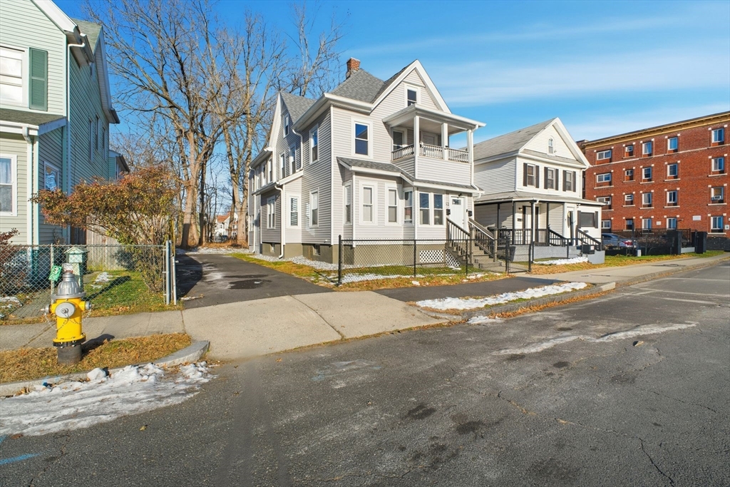 52 Osgood Street Springfield, MA 01107 - Photo 2 of 42 a view of a street in front of building