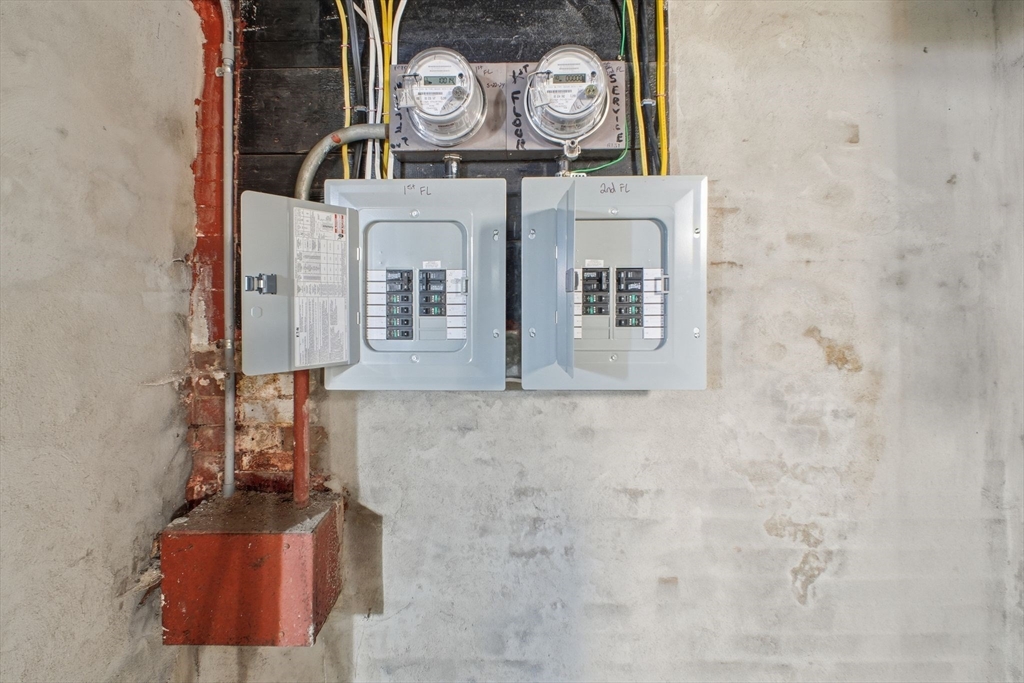 52 Osgood Street Springfield, MA 01107 - Photo 35 of 42 a bathroom with a sink and a mirror