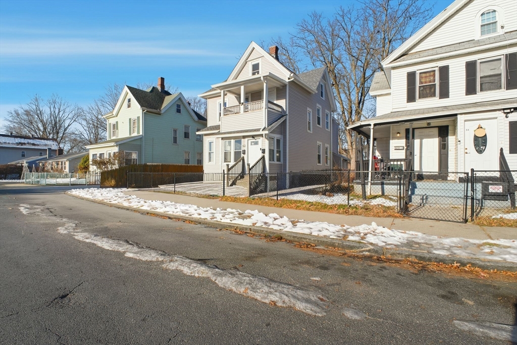 52 Osgood Street Springfield, MA 01107 - Photo 38 of 42 a front view of a house with a outdoor space