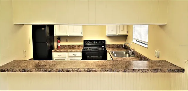 a view of a living room with a couch