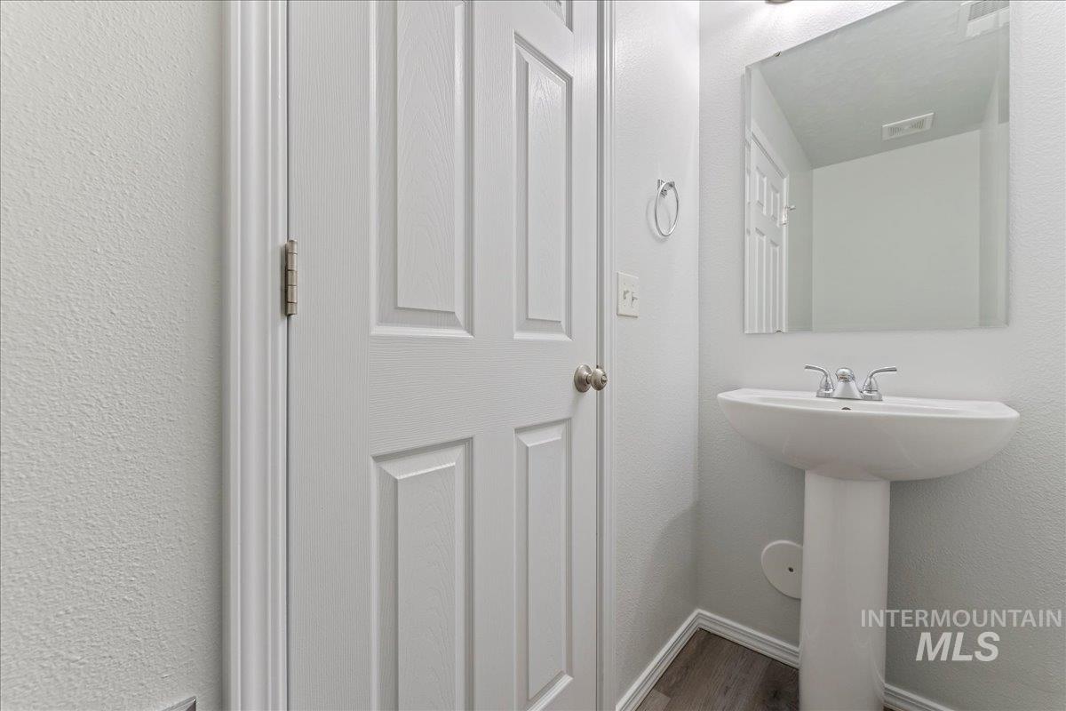 961 West Apple Pine Street Meridian, ID 83646 - Photo 23 of 30 Bathroom featuring a textured wall and baseboards