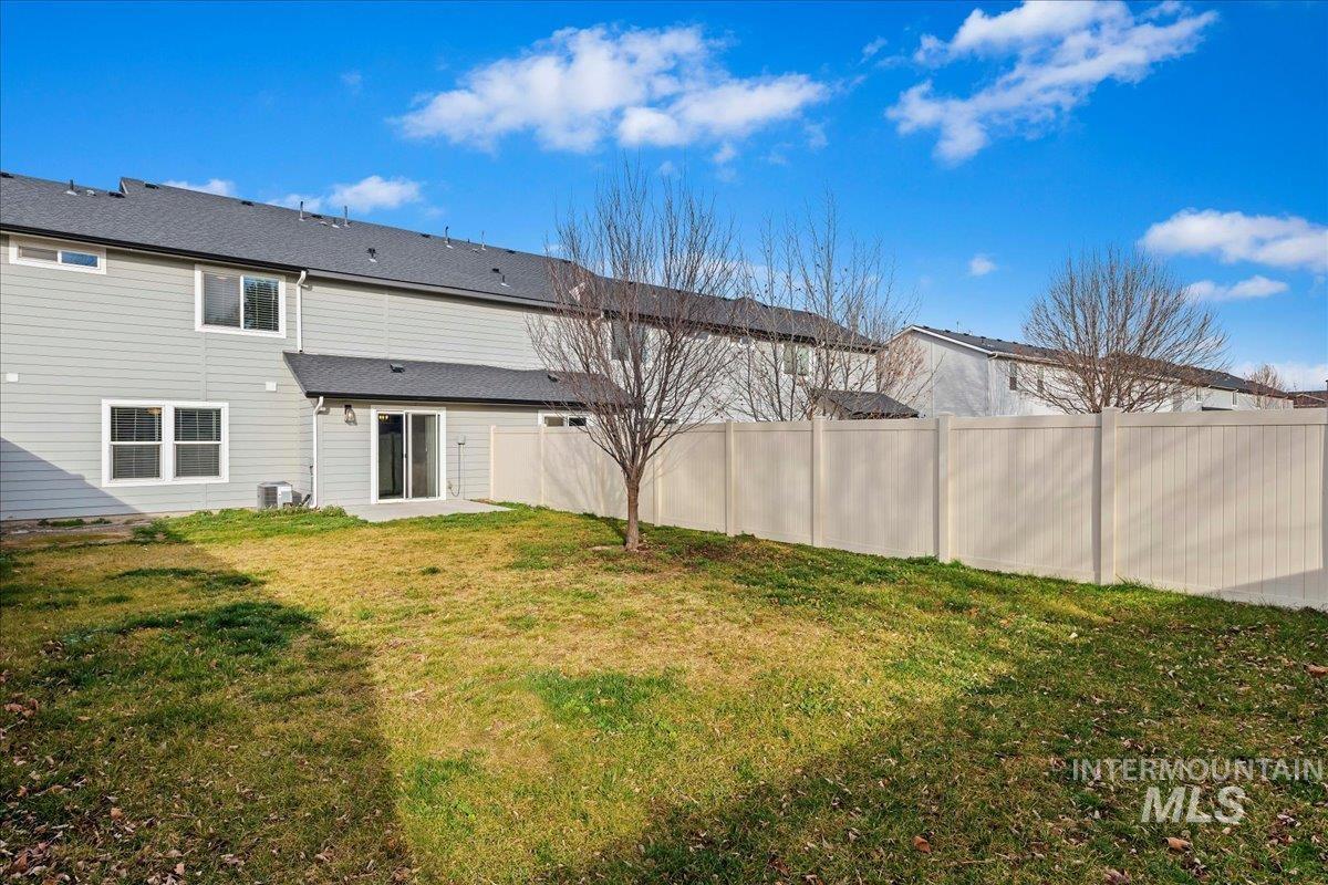 961 West Apple Pine Street Meridian, ID 83646 - Photo 25 of 30 Back of house featuring a patio area