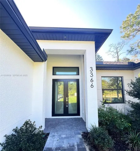 a view of a entryway door front of house