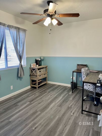 248 North Warner Street Ridgecrest, CA 93555 - Photo 15 of 21 a living room with furniture and a window