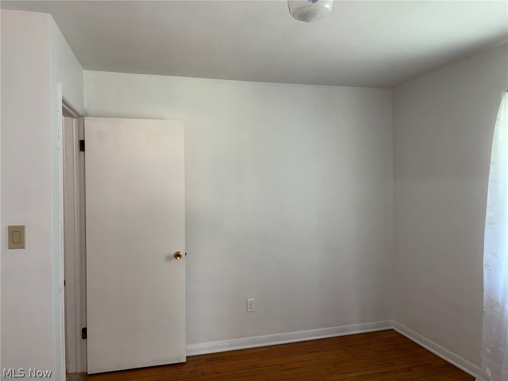 2140 Claus Road Vermilion, OH 44089 - Photo 18 of 50 Bedroom with hardwood floors