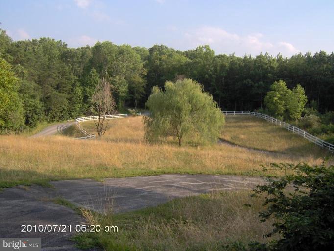 325 Silver Road Berkeley Springs, WV 25411 - Photo 8 of 21 a view of a water pond
