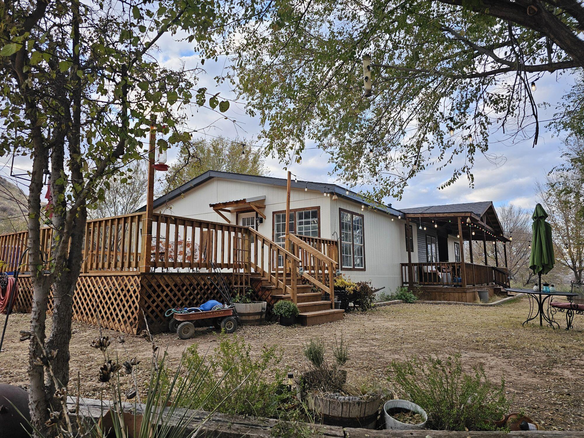 11120 Gentry Lane Slaton, TX 79364 - Photo 1 of 17 a view of a house with backyard and sitting area