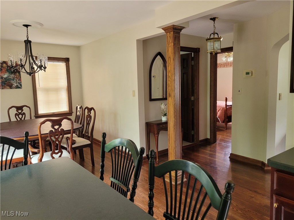 1372 Mayfield Ridge Road Cleveland, OH 44124 - Photo 8 of 37 Dining area with a chandelier, hardwood flooring