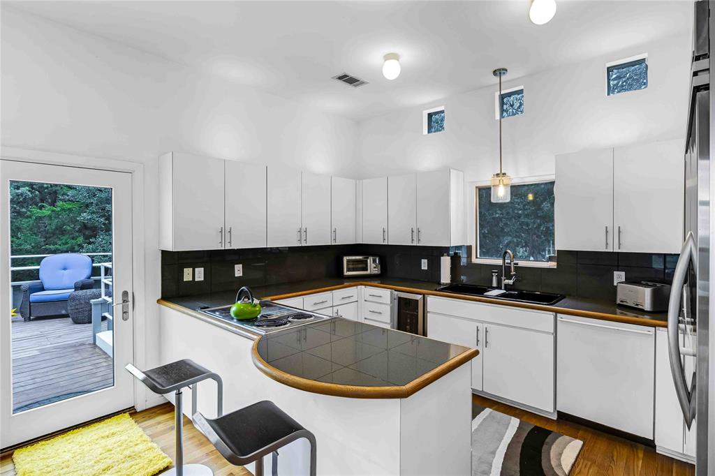 20 Summit Place Cedar Hill, TX 75104 - Photo 14 of 35 a kitchen with a sink a stove and cabinets