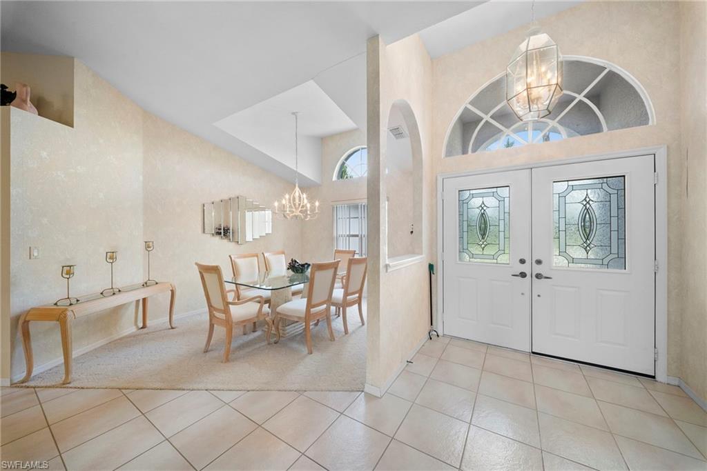 3971 Spring Garden Lane Estero, FL 33928 - Photo 21 of 31 a view of a livingroom with furniture and chandelier