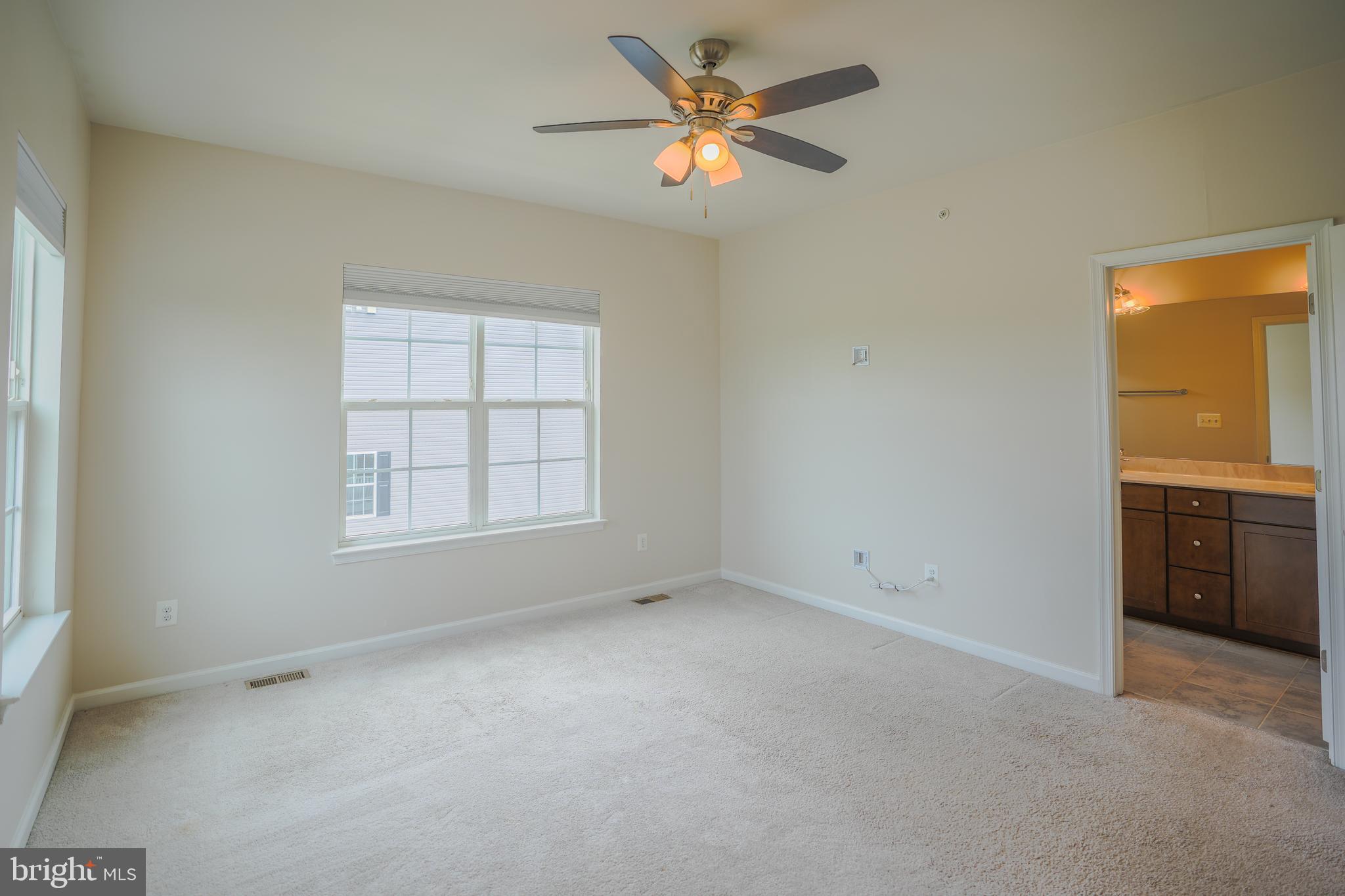 6150 Posey Street Frederick, MD 21703 - Photo 20 of 32 a view of an empty room with a window