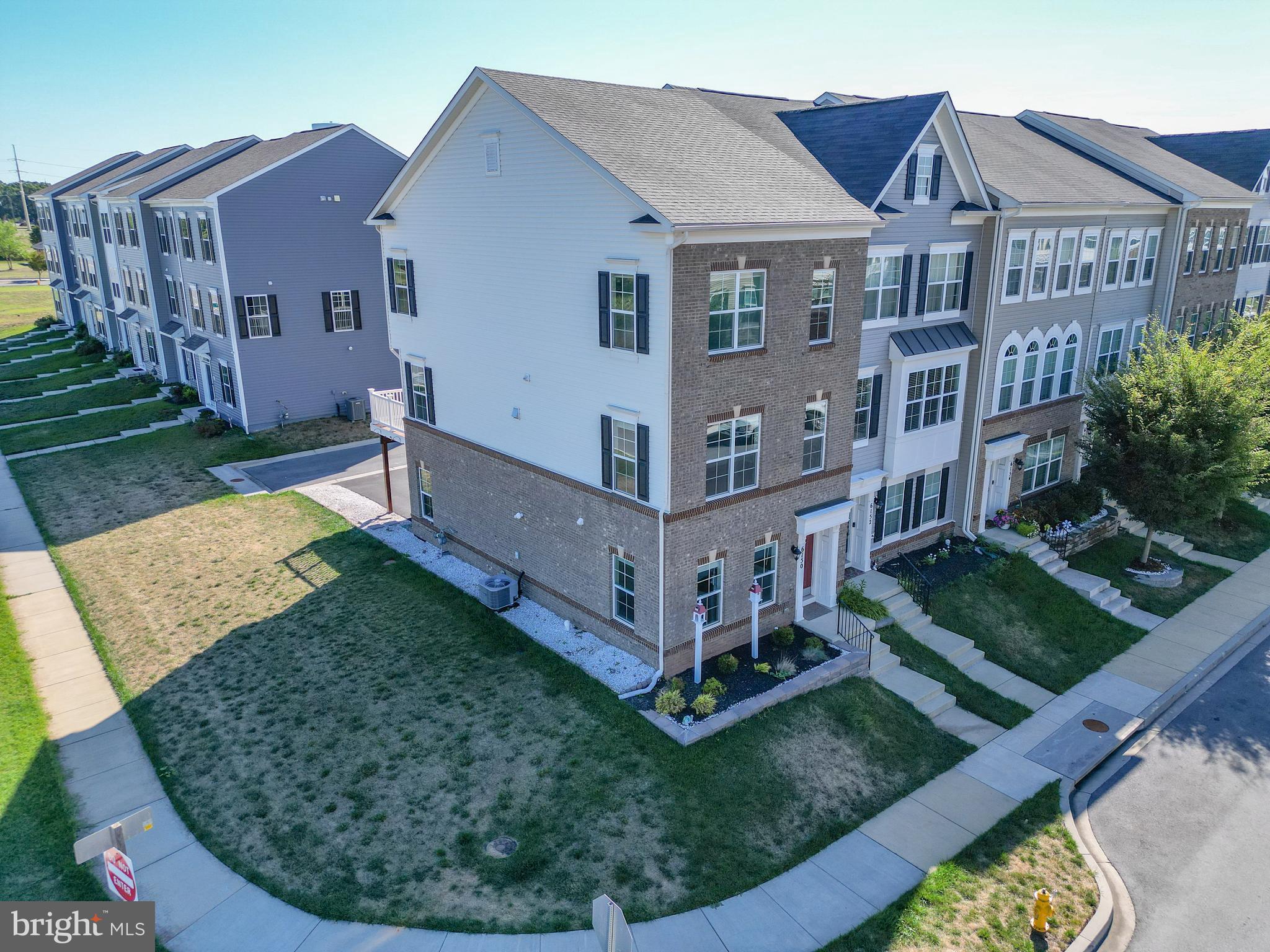 6150 Posey Street Frederick, MD 21703 - Photo 2 of 32 front view of a house with a yard