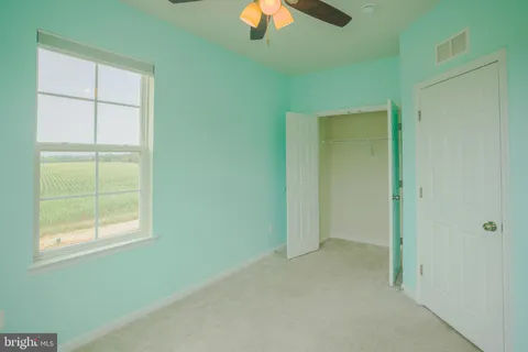 an empty room that has a window