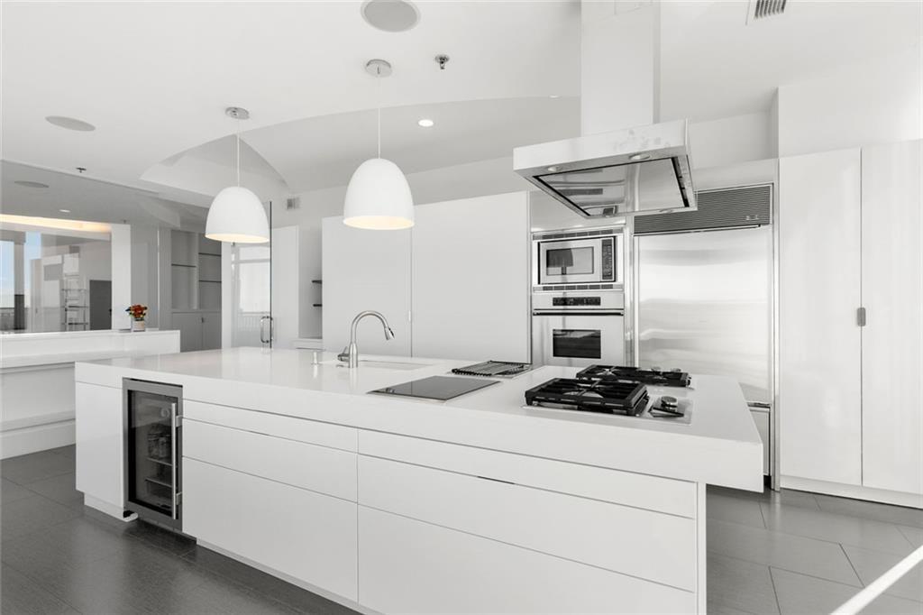 3338 Peachtree Road Northeast, Unit 3501 Atlanta, GA 30326 - Photo 16 of 46 a kitchen with a sink cabinets and appliances