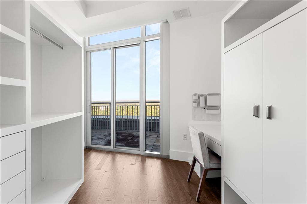 3338 Peachtree Road Northeast, Unit 3501 Atlanta, GA 30326 - Photo 27 of 46 a view of an empty room with a window