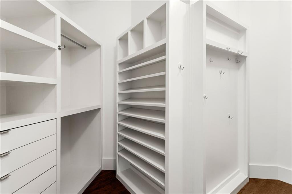 3338 Peachtree Road Northeast, Unit 3501 Atlanta, GA 30326 - Photo 28 of 46 a view of walk in closet with empty racks