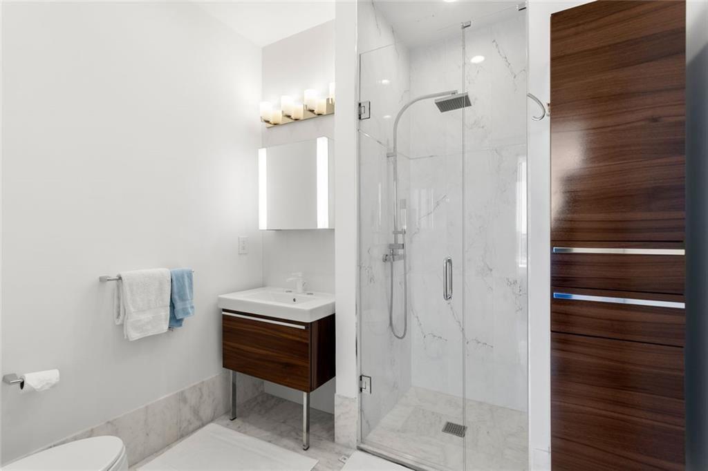 3338 Peachtree Road Northeast, Unit 3501 Atlanta, GA 30326 - Photo 37 of 46 a bathroom with a shower