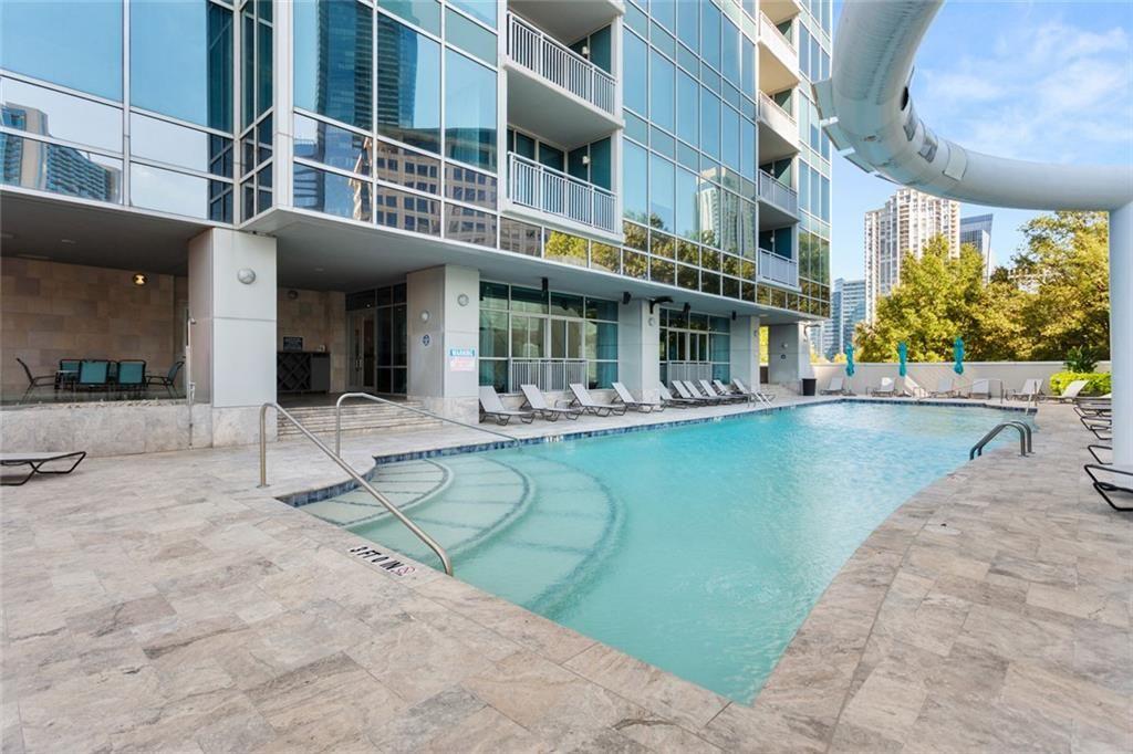 3338 Peachtree Road Northeast, Unit 3501 Atlanta, GA 30326 - Photo 38 of 46 a view of a building with a swimming pool