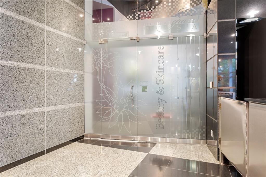 3338 Peachtree Road Northeast, Unit 3501 Atlanta, GA 30326 - Photo 40 of 46 a bathroom with a shower