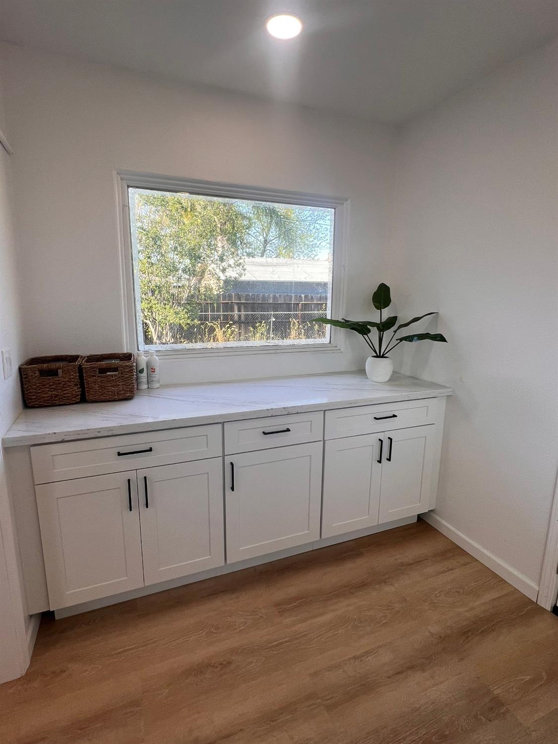 907 South 7th Street Fresno, CA 93702 - Photo 15 of 29 a kitchen with a sink and cabinets