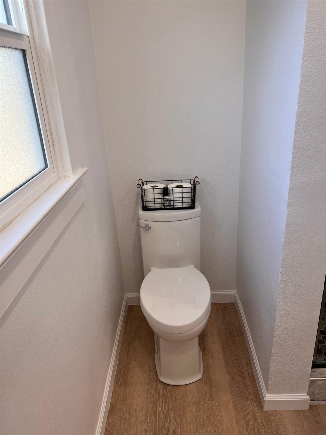 907 South 7th Street Fresno, CA 93702 - Photo 26 of 29 a bathroom with a sink and a toilet