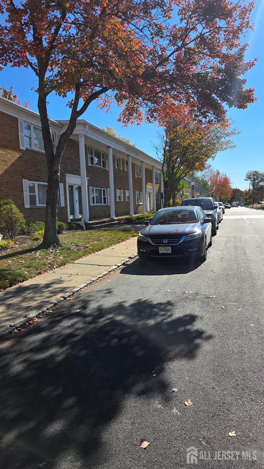 44 Judson Street, Unit 5A Edison, NJ 08837 - Photo 2 of 2 a front view of a house with a garden