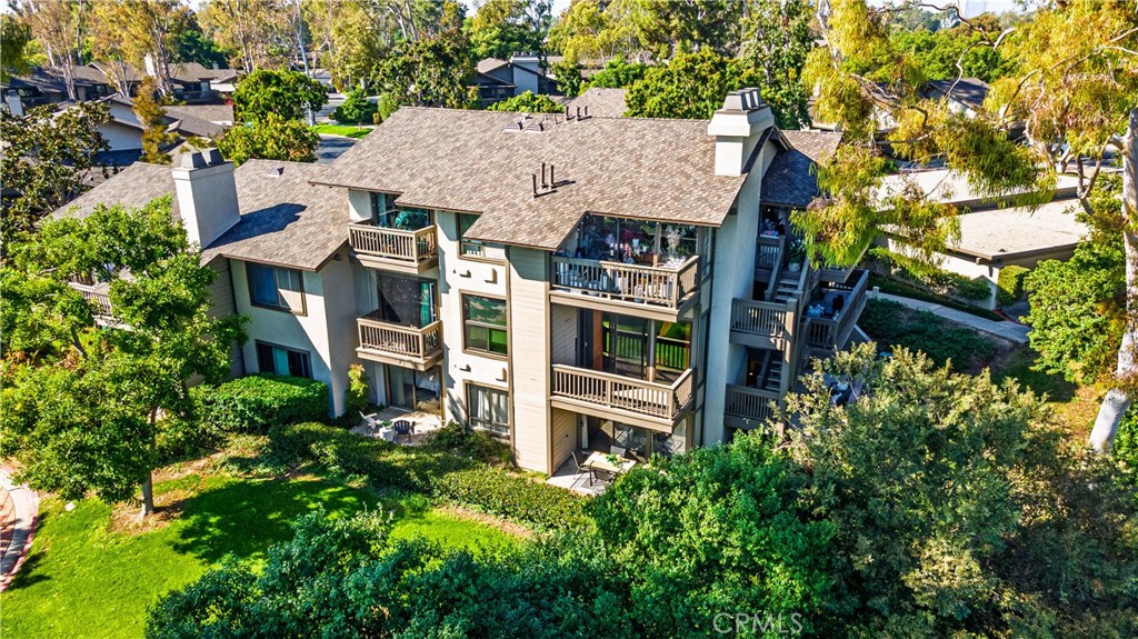 16 Rana, Unit 57 Irvine, CA 92612 - Photo 2 of 37 Back of home, pool and greenbelt views
