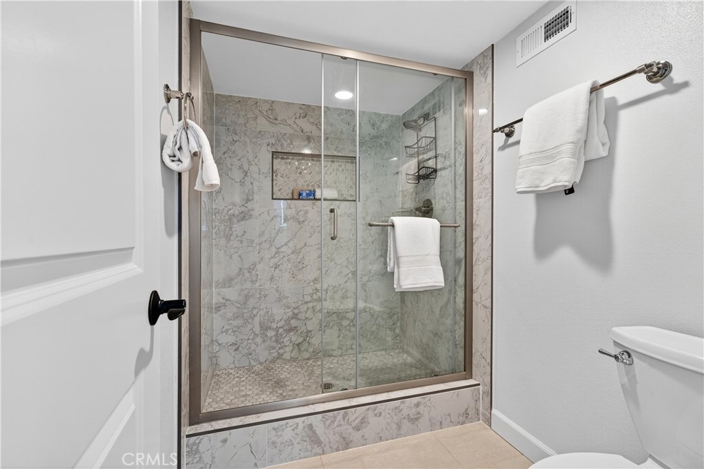 16 Rana, Unit 57 Irvine, CA 92612 - Photo 25 of 37 Primary Bathroom shower