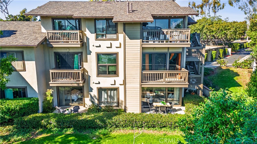 16 Rana, Unit 57 Irvine, CA 92612 - Photo 30 of 37 Back of home