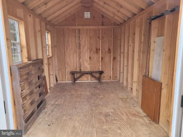 a view of a room with windows