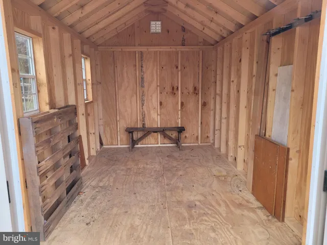 a view of a room with windows