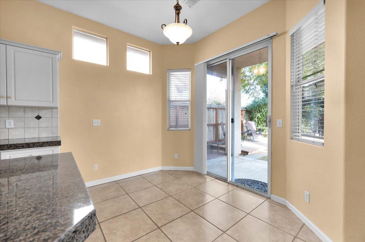 849 Megan Avenue Clovis, CA 93611 - Photo 11 of 53 a view of a kitchen with an empty space and a window