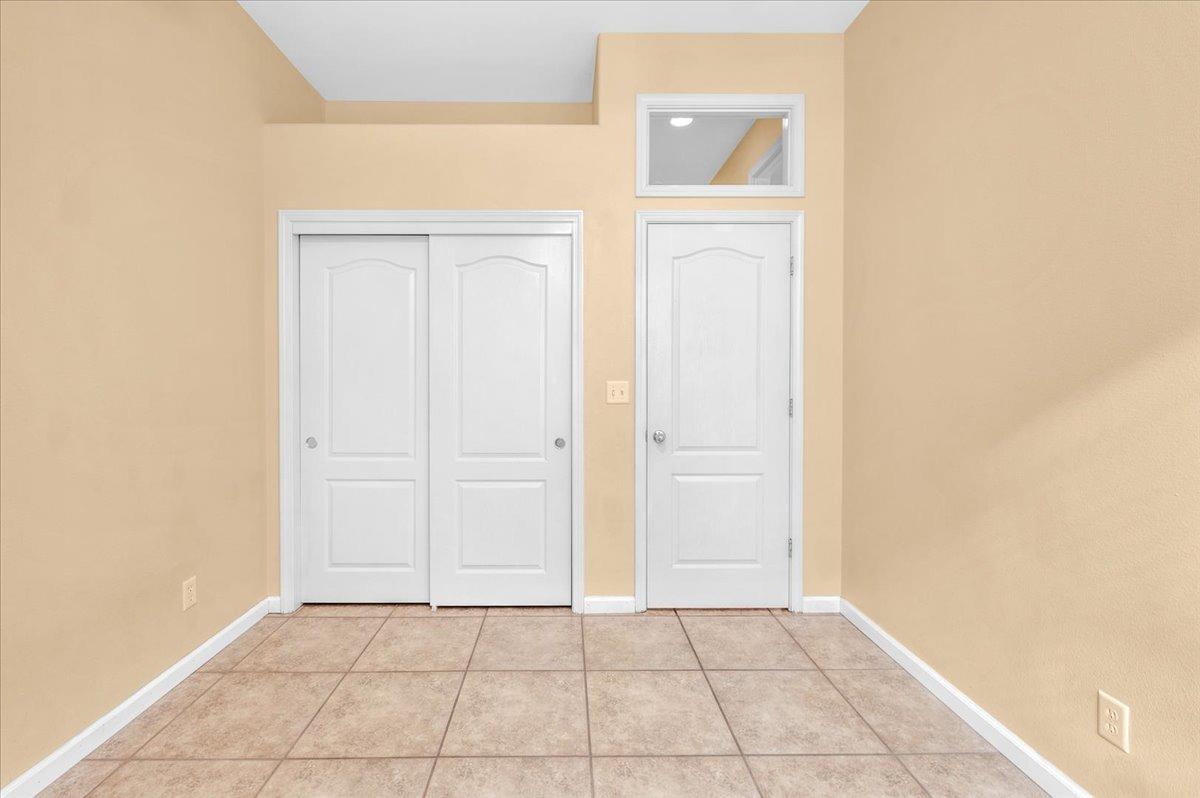849 Megan Avenue Clovis, CA 93611 - Photo 18 of 53 an empty room with a door