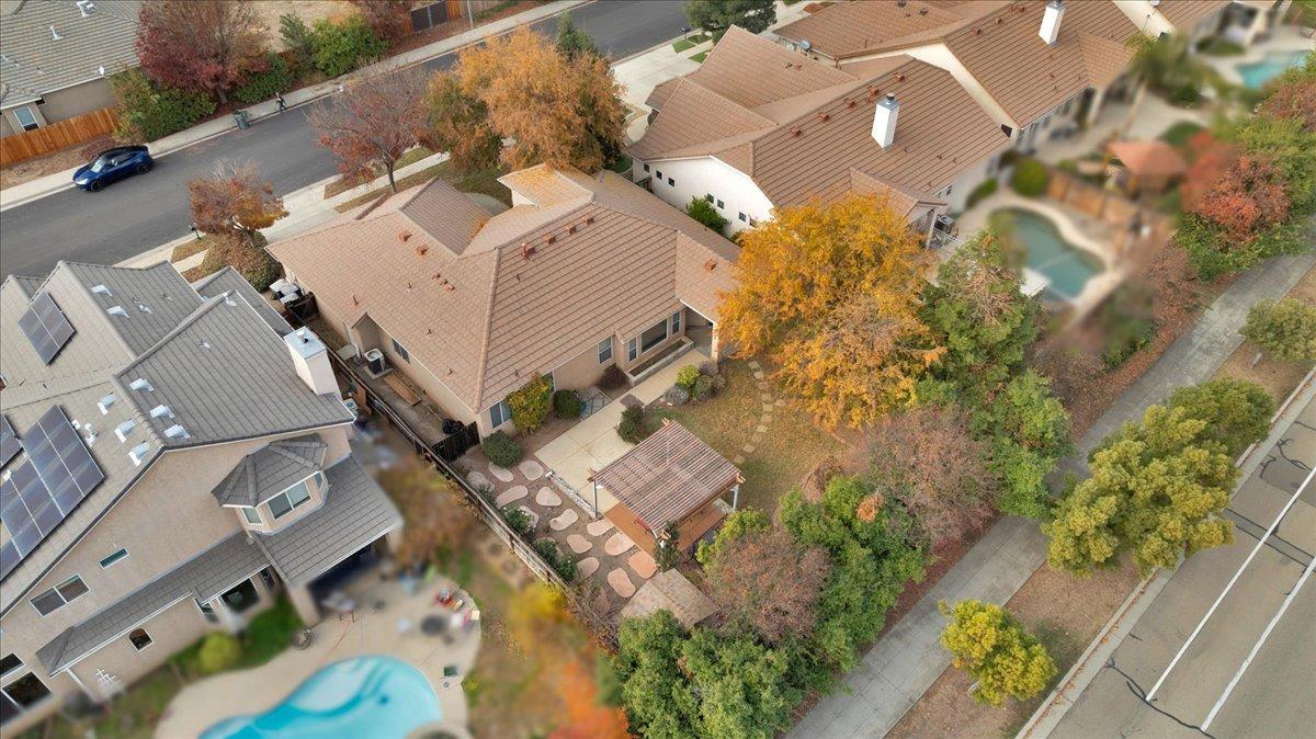 849 Megan Avenue Clovis, CA 93611 - Photo 39 of 53 an aerial view of a house with a yard