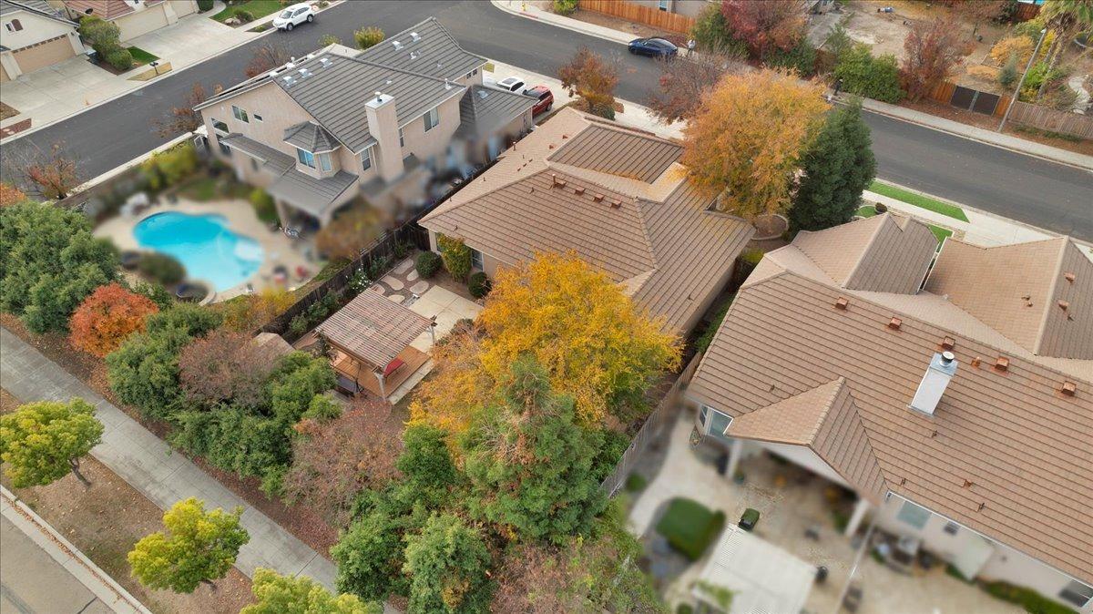 849 Megan Avenue Clovis, CA 93611 - Photo 41 of 53 an aerial view of a house with a yard and garden