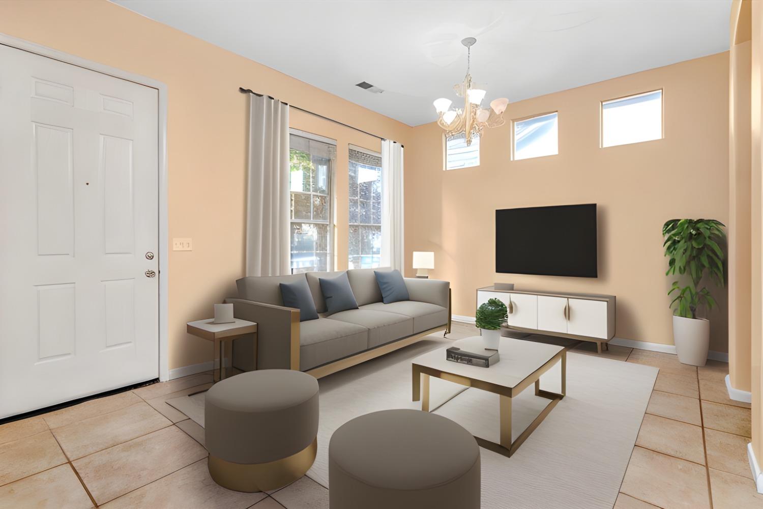 849 Megan Avenue Clovis, CA 93611 - Photo 52 of 53 a living room with furniture a flat screen tv and a window