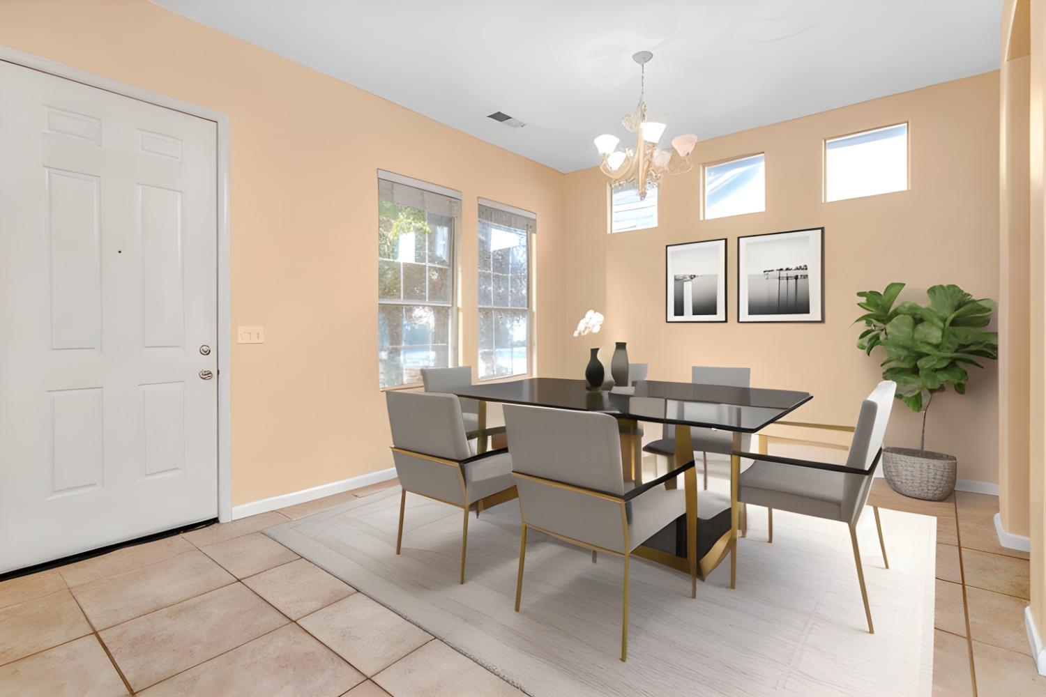 849 Megan Avenue Clovis, CA 93611 - Photo 53 of 53 a view of a dining room with furniture and chandelier