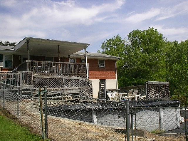 7007 Dallas Road Roanoke, VA 24019 - Photo 8 of 13 BACK OF HOME WITH ABOVE GROUND POOL